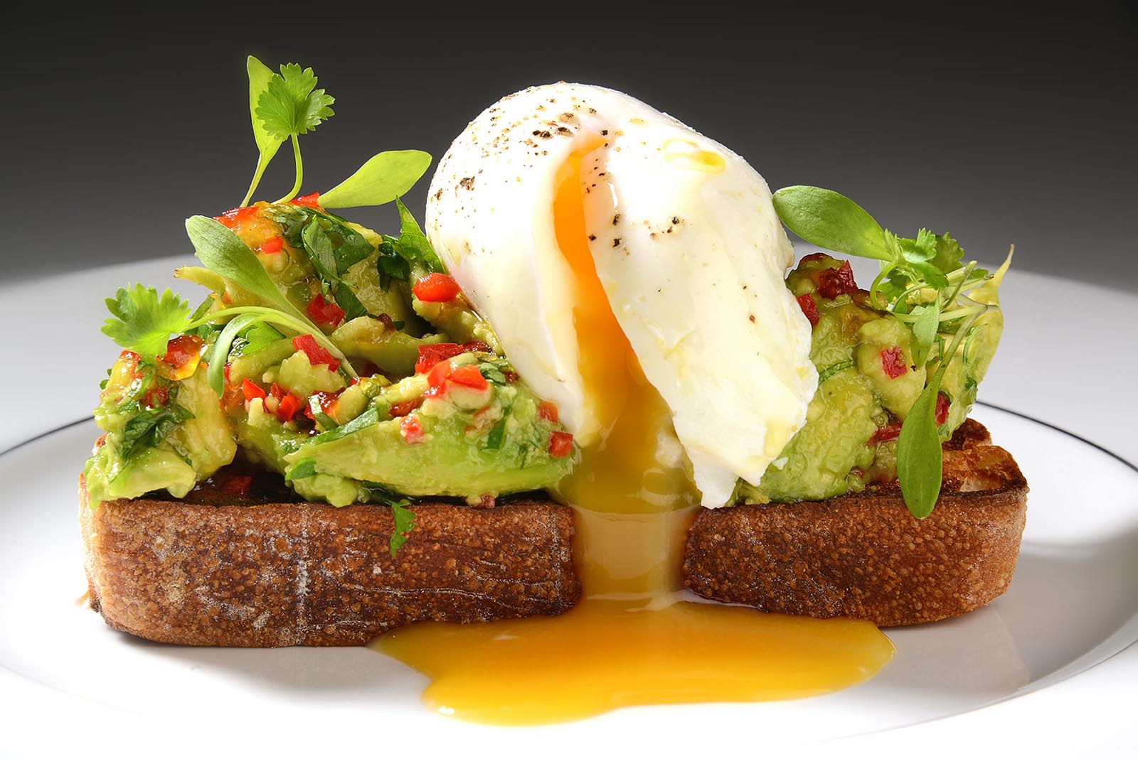 Avocado on toast with a poached egg