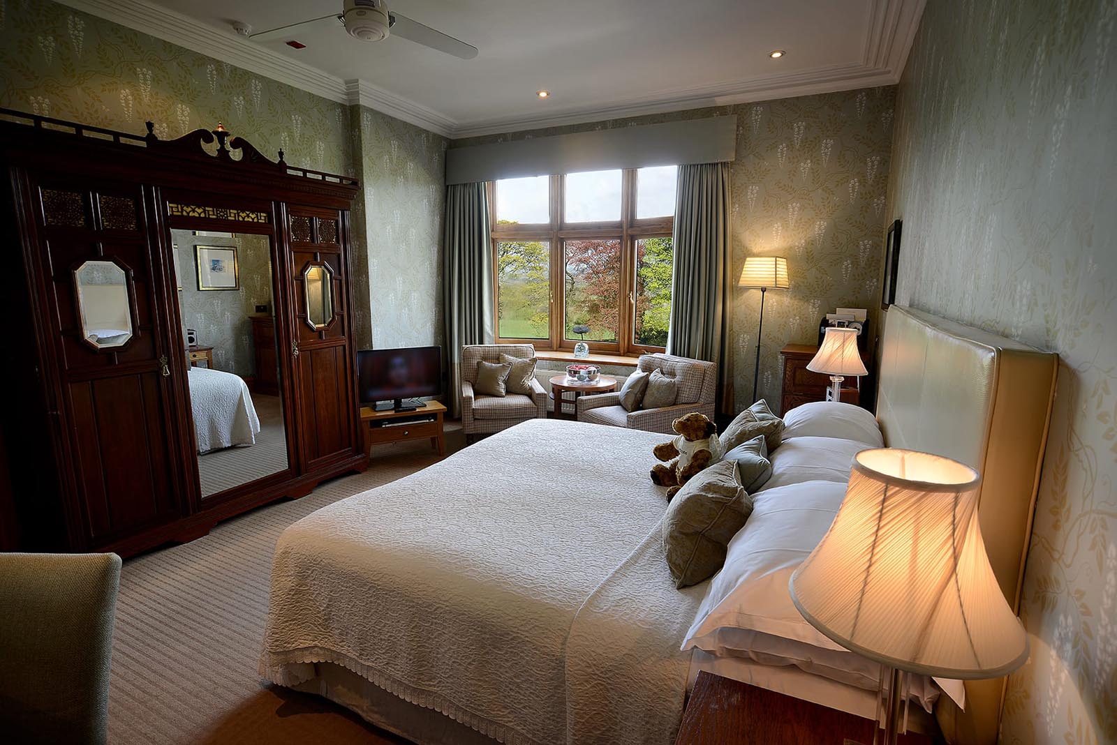 Large bed, seating area and large window